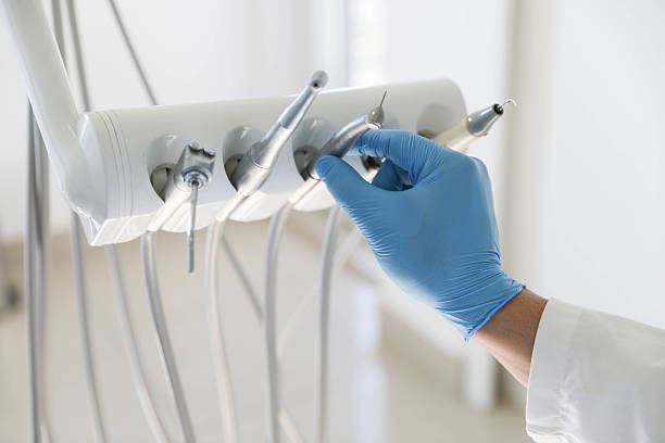 Professional Tooth Extraction technician working in North Bend, OR